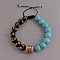 Retro style woven bead bracelet with Chinese elements for men.